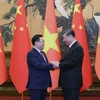 Chủ tịch Quốc hội Vương Đình Huệ hội kiến Tổng Bí thư, Chủ tịch Trung Quốc Tập Cận Bình. (Ảnh: Nhan Sáng/TTXVN)
