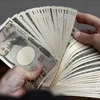 Đồng yen của Nhật Bản tại một ngân hàng ở Tokyo. (Ảnh: AFP/TTXVN)