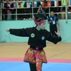 Vận động viên nữ Lào tham gia thi đấu Pencak Silat nội dung biễu diễn. (Ảnh: Văn Dũng/TTXVN)