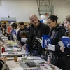 Người dân tham gia hội chợ việc làm tại New York, Mỹ, ngày 1/2/2023. (Ảnh: AFP/TTXVN)
