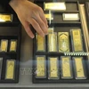 Vàng miếng được bày bán tại một cửa hàng ở tỉnh An Huy, Trung Quốc. (Ảnh: AFP/TTXVN)