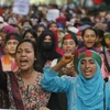 Người dân tham gia biểu tình phản đối chế độ hạn ngạch việc làm nhà nước tại Dhaka, Bangladesh, ngày 8/7/2024. (Ảnh: Getty Images/ TTXVN)
