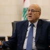 Thủ tướng Liban Najib Mikati phát biểu với báo giới tại Beirut. (Ảnh: AFP/TTXVN) 