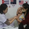 Tiêm vaccine sởi cho trẻ 1- 5 tuổi. (Ảnh: Bích Huệ/TTXVN)