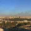 Khói bốc lên trong cuộc giao tranh tại Aleppo, Syria, ngày 1/12/2024. (Ảnh: THX/TTXVN)