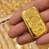 Vàng được bày bán tại một cửa hàng vàng ở Dubai (Các Tiểu vương quốc Arab thống nhất). (Ảnh: AFP/TTXVN)