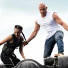 Các diễn viên chính, Nathalie Emmanuel trong vai Ramsey (trái) và Vin Diesel trong vai Dominic Toretto, trong phim "F9: The Fast Saga." (Nguồn: cnn.com)