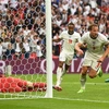 Tiền đạo Harry Kane (áo trắng, số 9) ăn mừng sau khi ghi bàn thắng nhân đôi cách biệt 2-0 cho Anh trong trận gặp Đức ở vòng 16 đội, EURO 2020 trên sân vận động Wembley ở London ngày 29/6/2021. (Ảnh: AFP/TTXVN)