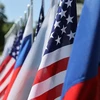 Quốc kỳ của Nga và Mỹ. (Nguồn: tass.com)