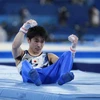 Vận động viên Kohei Uchimura, người Nhật Bản, rơi xuống từ xà ngang trong nội dung thể dục nghệ thuật nam tại Olympic Tokyo 2020, ngày 24/7/2021. (Nguồn: apnews.com)
