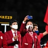 Đoàn thể thao Việt Nam diễu hành tại Lễ khai mạc Paralympic Tokyo 2020 ở Tokyo (Nhật Bản), ngày 24/8/2021. (Ảnh: AFP/ TTXVN)