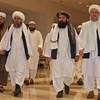 Phái đoàn quan chức Taliban tham gia đàm phán với đại diện Chính phủ Afghanistan tại Doha (Qatar), ngày 12/8/2021. (Ảnh: AFP/TTXVN)