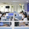 Tổng đài 1022 Đà Nẵng tiếp nhận và xử lý thông tin của người dân, doanh nghiệp. (Ảnh: TTXVN)