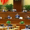 Bộ trưởng Bộ Kế hoạch và Đầu tư Nguyễn Chí Dũng giải trình, làm rõ một số vấn đề đại biểu Quốc hội nêu. (Ảnh: Văn Điệp/TTXVN)