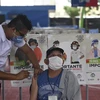 Một điểm tiêm chủng vaccine ngừa COVID-19 ở Guatemala City (Guatemala), ngày 8/3/2021. (Ảnh: AFP/TTXVN)