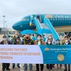 Đà Nẵng đón chuyến bay thí điểm đầu tiên đưa du khách quốc tế đến Việt Nam, chiều 17/11/2021, sau thời gian tạm ngưng do ảnh hưởng của dịch COVID-19. (Ảnh: TTXVN)