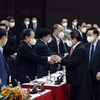 Thủ tướng Chính phủ Phạm Minh Chính với các đại biểu tham dự hội thảo. (Ảnh: Thống Nhất/TTXVN)