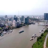 Khu trung tâm Quận 1 (Thành phố Hồ Chí Minh) bên bờ sông Sài Gòn. (Ảnh: Thanh Vũ/TTXVN)