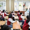 Diễn tập đón học sinh trở lại học trực tiếp tại Trường Trung học cơ sở Giảng Võ, quận Ba Đình (Hà Nội). (Ảnh: Thanh Tùng/TTXVN)