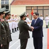 Thủ tướng Phạm Minh Chính đến thăm cán bộ, chiến sỹ Cục C05 và C07, chiều 30/1/2022. (Ảnh: Dương Giang/TTXVN)