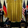 Tổng thống Mỹ Joe Biden (phải) và Thủ tướng Đức Olaf Scholz tại cuộc họp báo chung sau hội đàm ở Nhà Trắng, Washington, D.C. (Mỹ), ngày 7/2/2022. (Ảnh: AFP/TTXVN)