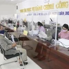 Người dân đến thực hiện các thủ tục hành chính tại Trung tâm phục vụ hành chính công tỉnh Ninh Thuận. (Ảnh: Nguyễn Thành/TTXVN)