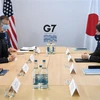 Ngoại trưởng Nhật Bản Yoshimasa Hayashi (phải) trong cuộc hội đàm với người đồng cấp Mỹ Antony Blinken (trái) bên lề Hội nghị Ngoại trưởng G7 ở Liverpool (Anh), hồi tháng 12/2021. (Ảnh: AFP/TTXVN)