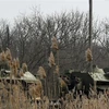 Xe quân sự của Nga được triển khai ở vùng Rostov, miền Nam Nga, giáp với Cộng hòa nhân dân Donetsk (DPR) tự xưng ở miền Đông Ukraine, ngày 23/2/2022. (Ảnh: AFP/TTXVN)