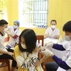 Tiêm vaccine cho trẻ em tại Tam Đảo (Vĩnh Phúc). (Ảnh: Hoàng Hùng/TTXVN)