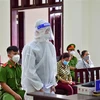 Bị cáo Nguyễn Văn Quốc tại phiên xét xử. (Ảnh: Thanh Tân/TTXVN)