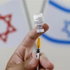 Một điểm tiêm chủng vaccine ngừa COVID-19 ở Tel Aviv (Israel). (Ảnh: AFP/TTXVN)