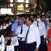 Chủ tịch nước Nguyễn Xuân Phúc dự Lễ phát động tháng nhân đạo năm 2022, tại Thừa Thiên-Huế tối 28/4/2022. (Ảnh: Thống Nhất/TTXVN)