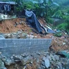 Mưa lớn gây sạt lở một số công trình của hộ gia đình ở Lạng Sơn. (Ảnh: TTXVN phát)
