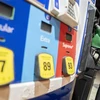 Một trạm xăng ở Washington, D.C. (Mỹ). (Ảnh: AFP/TTXVN)