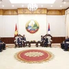 Quang cảnh buổi hội kiến giữa Chủ tịch Quốc hội Vương Đình Huệ và Thủ tướng Lào Phankham Viphavanh. (Ảnh: Doãn Tấn/TTXVN