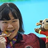 Vận động viên Flairene Candrea Wonomiharjo của Indonesia giành huy chương Vàng ở nội dung 100m bơi ngửa nữ tại SEA Games 31. (Nguồn: sport.tempo.co)