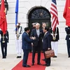 Tổng thống Hoa Kỳ Joe Biden đón Thủ tướng Phạm Minh Chính tại Washington D.C. tối 12/5/2022 (giờ địa phương). (Ảnh: Dương Giang/TTXVN)