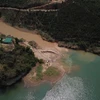 Đất thuộc lòng hồ thủy điện Đồng Nai 3 bị lấn chiếm. (Nguồn: thanhnien.vn)