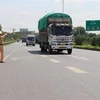 Lực lượng Cảnh sát giao thông, Công an tỉnh Bắc Ninh điều khiển giao thông tại cao tốc Hà Nội-Lạng Sơn, đoạn đi qua thành phố Bắc Ninh. (Ảnh: Thanh Thương/TTXVN)