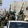 Các tay súng thuộc lữ đoàn Ezz-Al Din Al-Qassam, cánh vũ trang của Hamas, tại Rafah ở Dải Gaza ngày 28/5/2021. (Ảnh: AFP/TTXVN)