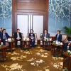 Bộ trưởng Bộ Nội vụ Phạm Thị Thanh Trà tiếp các trưởng đoàn dự hội nghị. (Ảnh: Văn Điệp/TTXVN)