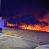 Khói lửa cháy rừng bốc ngùn ngụt tại vùng núi Sierra Bermeja ở tỉnh Malaga (Tây Ban Nha), ngày 9/9/2021. (Ảnh: AFP/TTXVN)