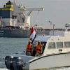 Tàu thuyền đi lại qua kênh đào Suez (Ai Cập). (Ảnh: AFP/TTXVN)