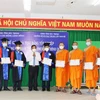 Ngày 19/3/2022, tại Sóc Trăng, Trường Cao đẳng Cộng đồng Sóc Trăng phối hợp Trường Bổ túc văn hóa Pali Trung cấp Nam Bộ tổ chức lễ bế giảng và trao bằng tốt nghiệp lớp cao đẳng sư phạm tiếng Khmer hệ chính quy khóa học 2018-2021. (Ảnh: Chanh Đa/TTXVN)