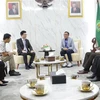Đoàn đại biểu Ban Tôn giáo Chính phủ do Phó trưởng ban Nguyễn Tiến Trọng (thứ tư, trái) làm Trưởng đoàn làm việc với Đoàn đại biểu Bộ Tôn giáo Indonesia. (Ảnh: Hữu Chiến/TTXVN)