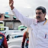 Tổng thống Venezuela Nicolas Maduro vẫy tay chào đám đông trong một ngày làm việc tại Caracas, ngày 13/9/2022. (Nguồn: france24.com)