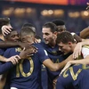 Niềm vui của các tuyển thủ Pháp sau bàn mở tỷ số trước Đan Mạch trong trận đấu bảng D, vòng chung kết World Cup 2022 ở Qatar ngày 26/11/2022 (Ảnh: THX/TTXVN)