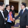 Chủ tịch Quốc hội Vương Đình Huệ với cộng đồng người Việt tại Australia. (Ảnh: Doãn Tấn/TTXVN)