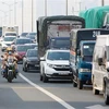 Cảnh sát điều tiết giao thông trên tuyến đường Vành đai 3 (Hà Nội), tháng 9/2022. (Ảnh: Phạm Kiên/TTXVN)