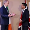 Thủ tướng Anh Rishi Sunak (phải) trong cuộc gặp người đồng cấp Ireland Micheál Martin tại Blackpool, Tây Bắc xứ England, ngày 10/11/2022. (Ảnh: Reuters/TTXVN)